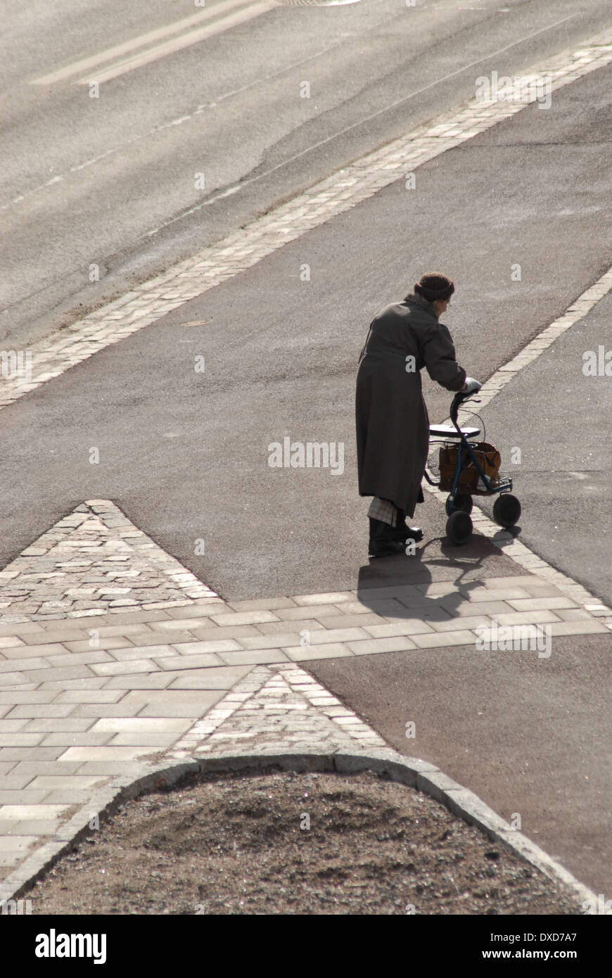 Old lady with zimmer frame. Stock Photo
