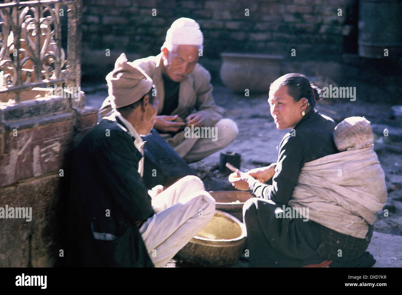 Woman with baby and two men, Nepal, 1969 Stock Photo