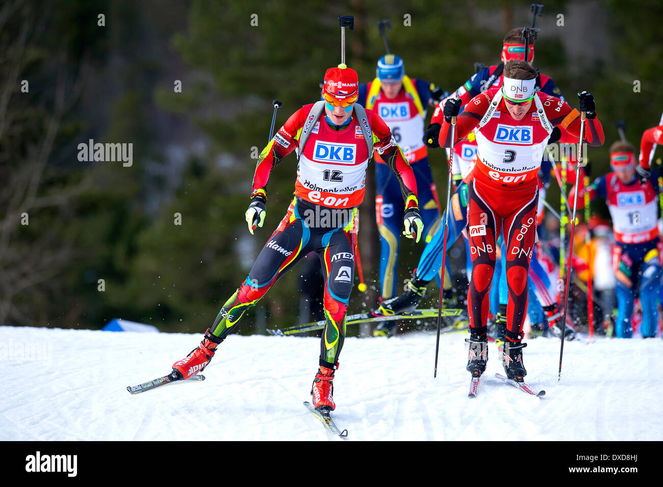Oslo, Norway. 24th Mar, 2014. The E.ON World Cup Biathlon 2014 L-R Ondrej Moravec of Czech Republic, Emil Hegle Svendsen of Norway competes in the men's 15 kilometre mass start during the World Cup Biathlon at Holmenkollen in Oslo, Norway. Credit:  Action Plus Sports Images/Alamy Live News Stock Photo