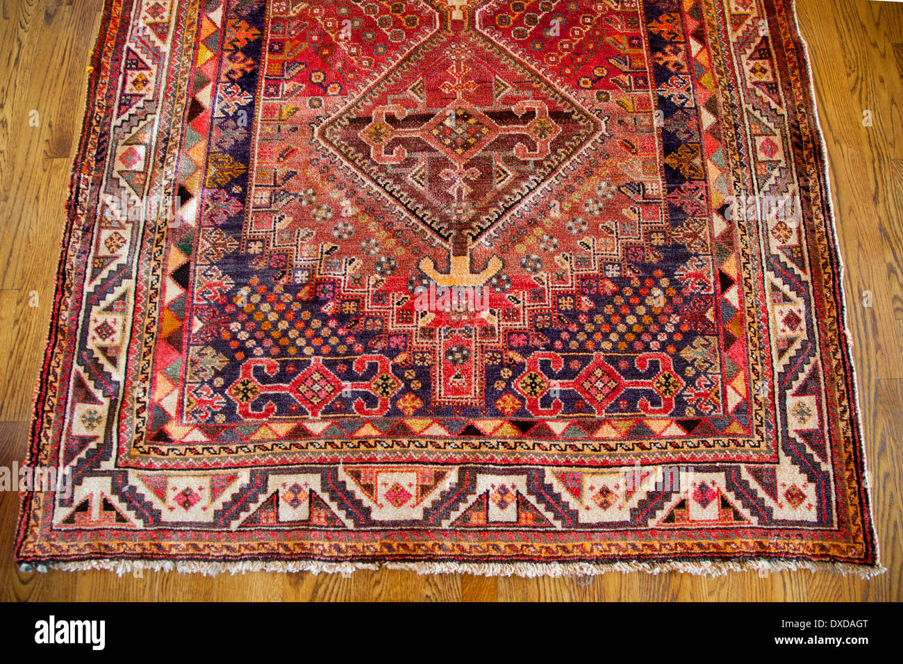 Antique hand made rug from Iran Stock Photo Alamy