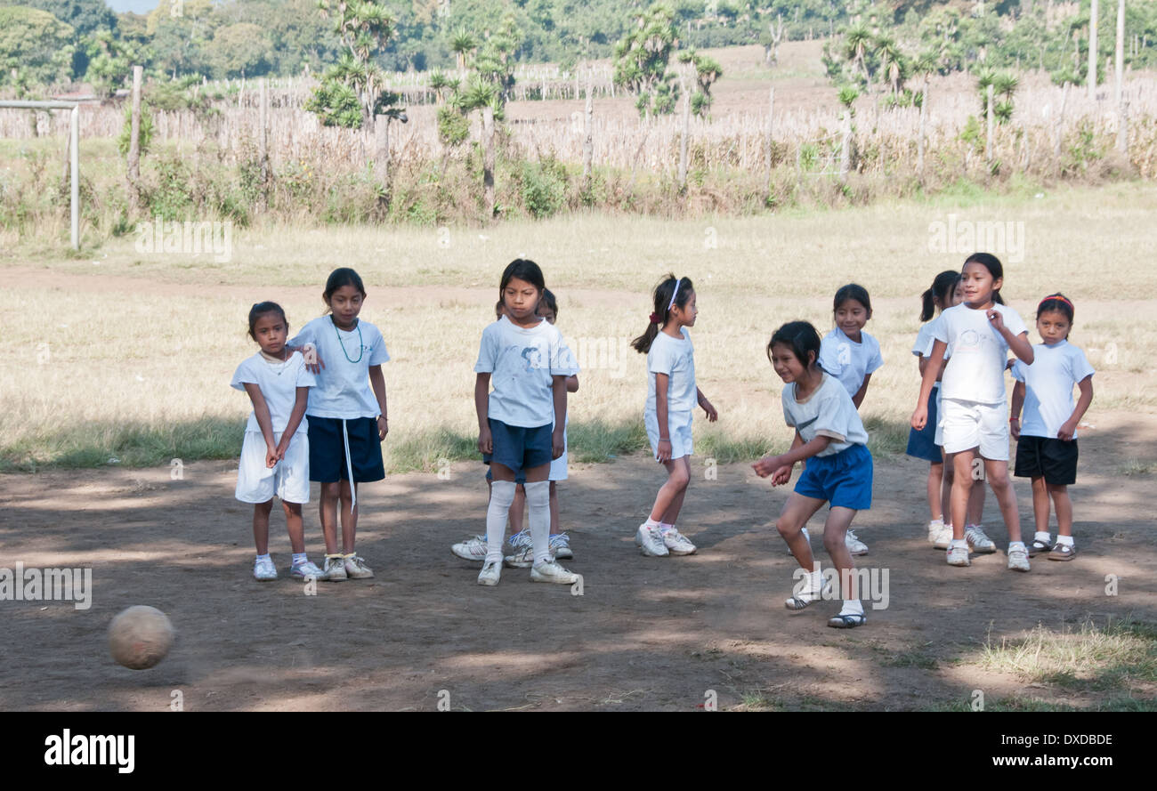 Schoolgirls in Guatemala playing soccer Stock Photo