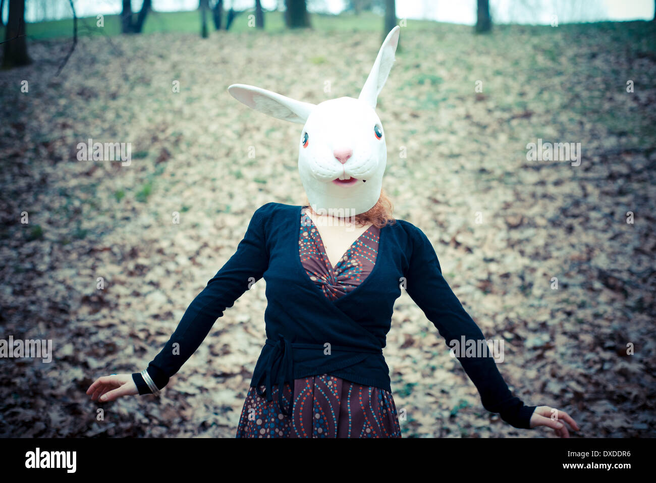 rabbit mask unreal woman at the park Stock Photo - Alamy