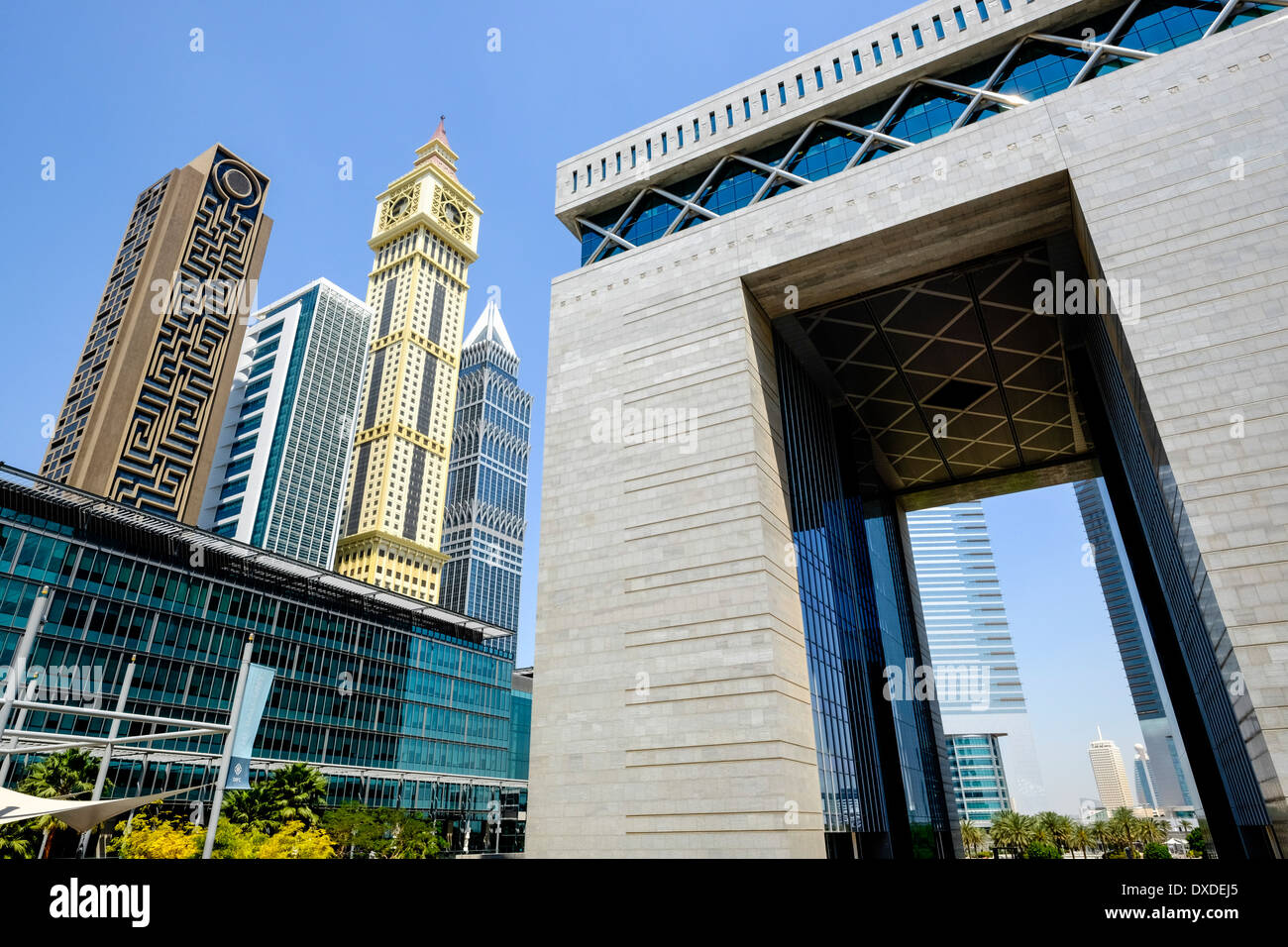 view of modern skyline and The Gate at DIFC Dubai International Financial Center in Dubai United Arab Emirates Stock Photo