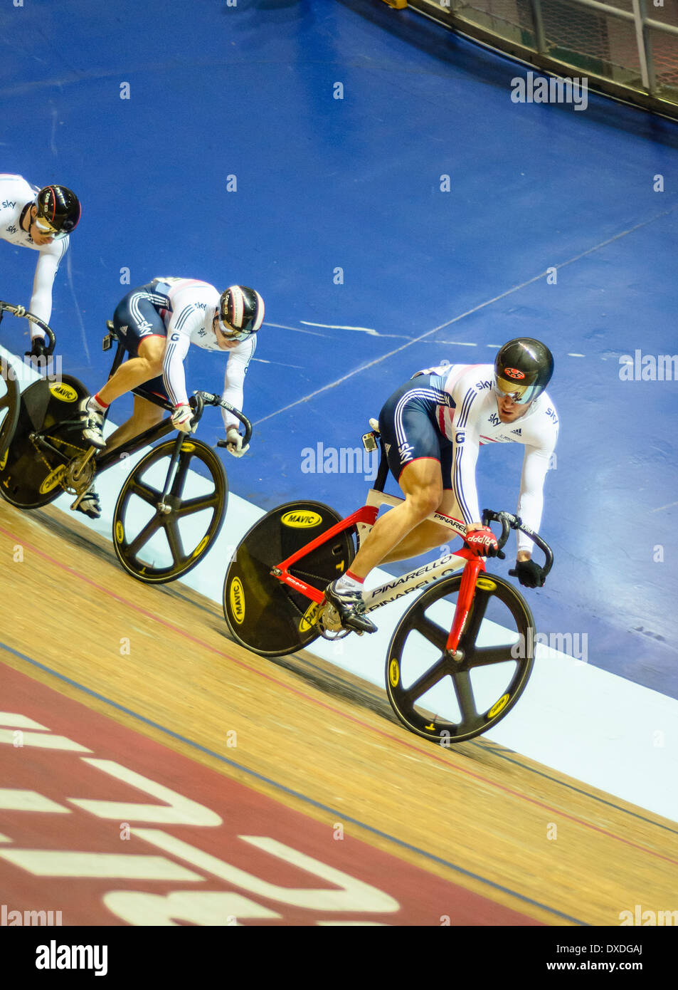 Cyclists in keirin race in Revolution Series meet at the Manchester Velodrome or National Cycling Centre Stock Photo