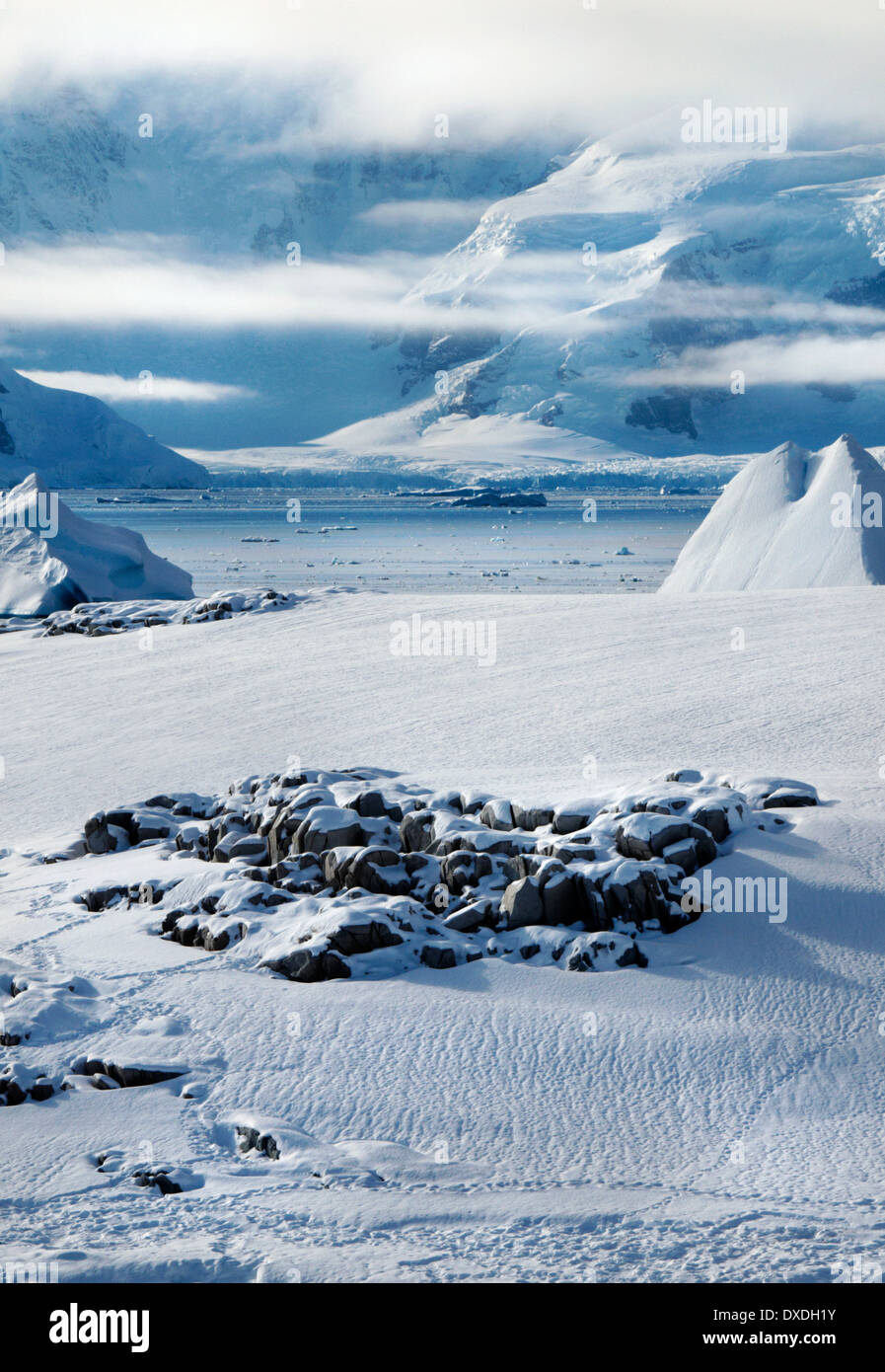 A view across the frozen landscape of Charlotte Bay in Antarctica Stock Photo