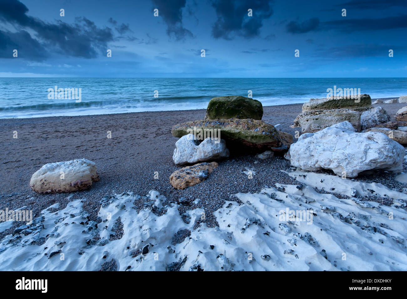 rocky ocean coast in dusk, Etretat, Normandy, France Stock Photo - Alamy