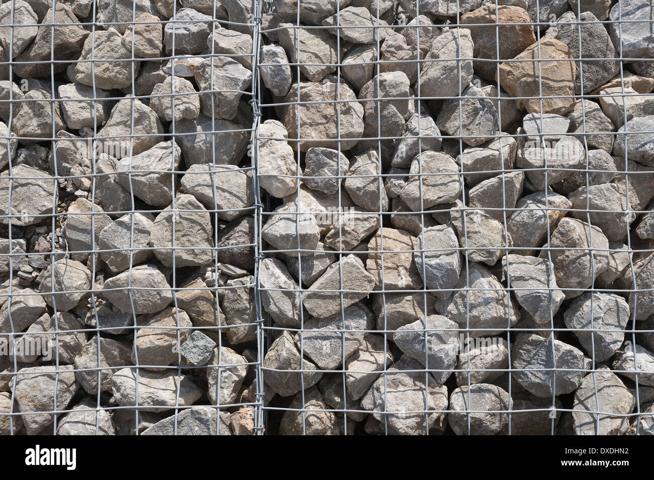 Caged rock riprap in stainless steel frames used as a structural Stock