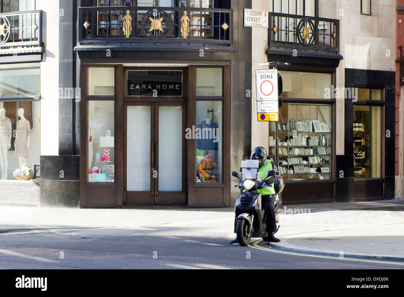 Motorbike Courier on the streets of London England Stock Photo Alamy