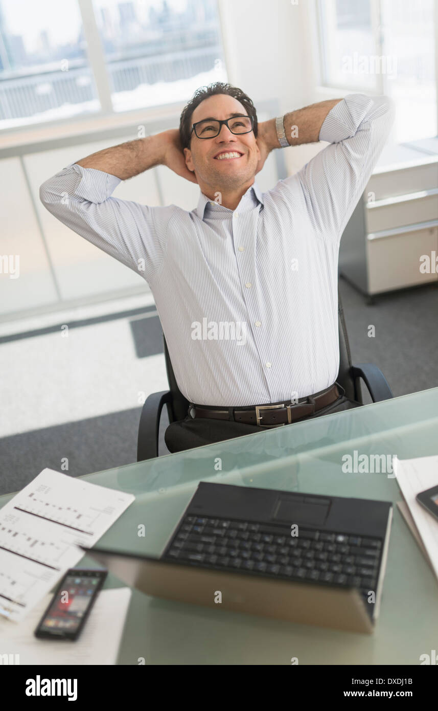 Businessman using laptop and digital tablet Stock Photo
