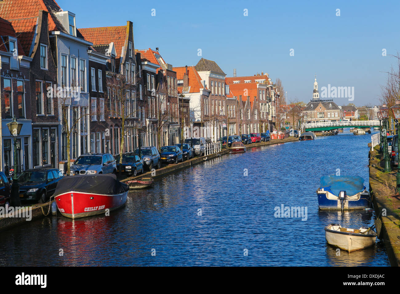 LEIDEN, THE NETHERLANDS - MARCH 16, 2014: The famous Old Rhine going through the center of Leiden, The Netherlands. Stock Photo