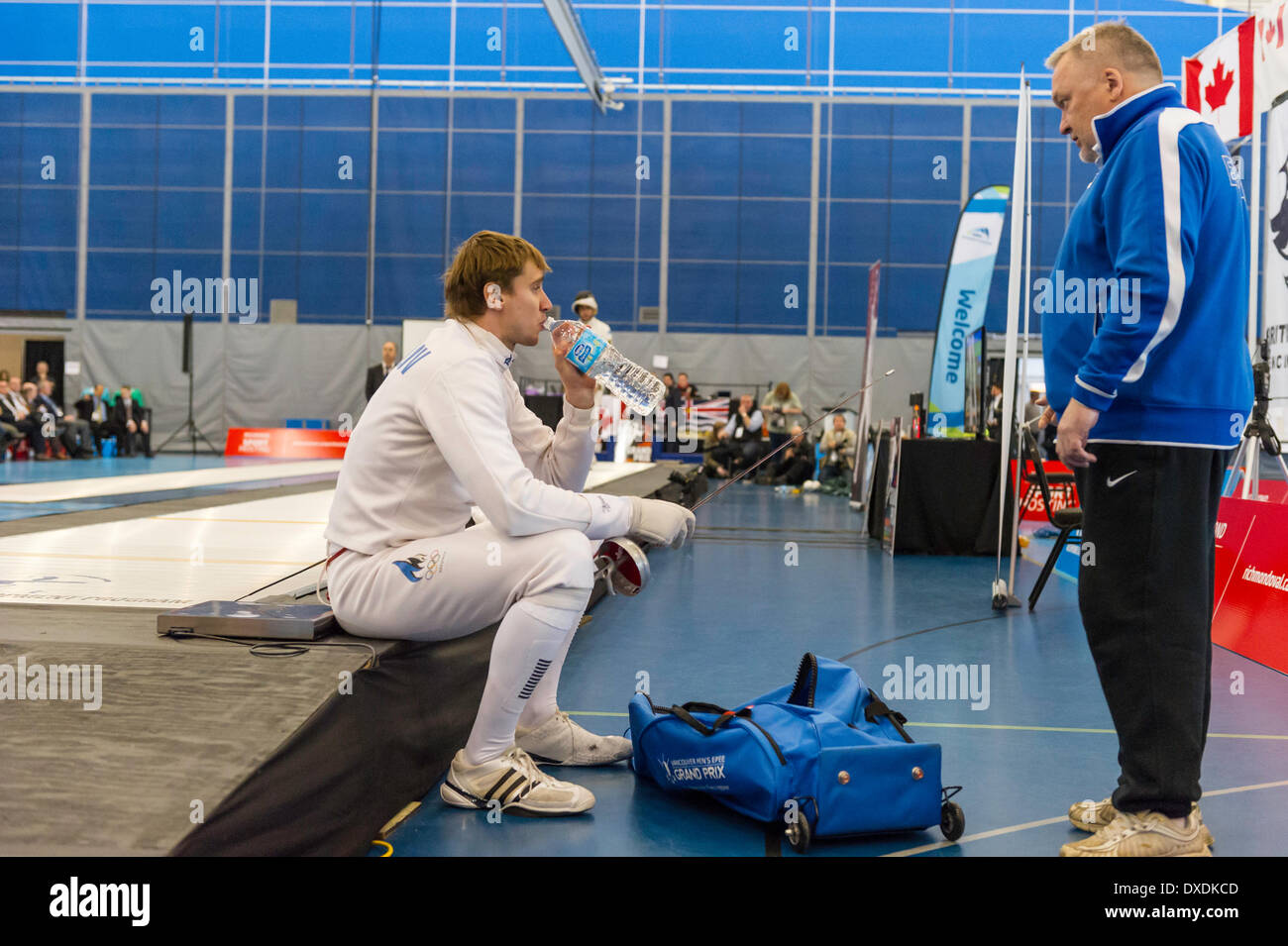 NOVOSJOLOV (EST) talking to coach at break at Vancouver Men's 2014 Grand Prix of Epee at Richmond Olympic Oval Richmond , British Columbia Canada on March 23  2014 . Photographer : Frank Pali Stock Photo