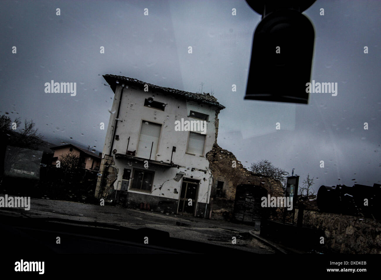 March 24, 2014 - L'Aquila, Italy - A damaged building in Onna, L'Aquila, on March 24, 2014. Onna one of the countries most affected by the earthquake of April 6, 2009 with the highest number of deaths, 40. Most of the buildings of the town are destroyed and other buildings have suffered serious damage. Five years after the earthquake, the inhabitants live in the new wooden houses built with the contribution of the Autonomous Province of Trento. (Credit Image: © Manuel Romano/NurPhoto/ZUMAPRESS.com) Stock Photo