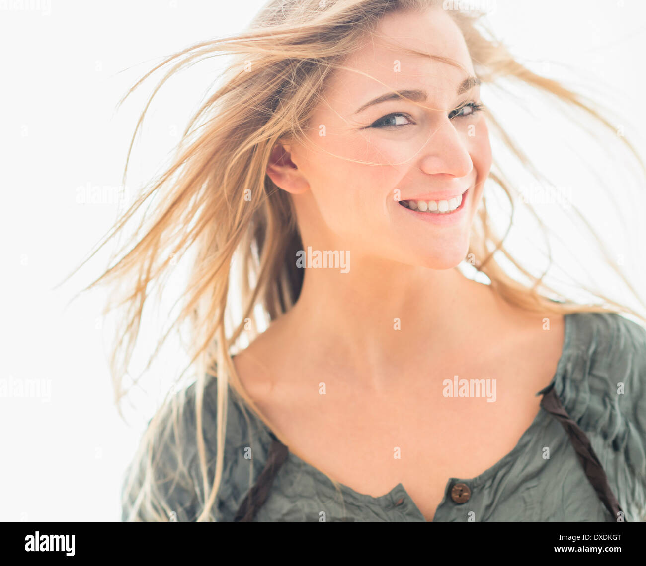 Young blonde woman toss hair hi-res stock photography and images - Alamy