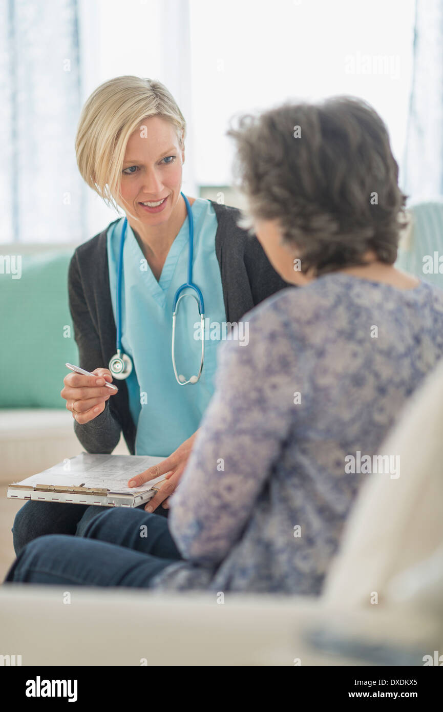 Mature woman and nurse hi-res stock photography and images - Alamy