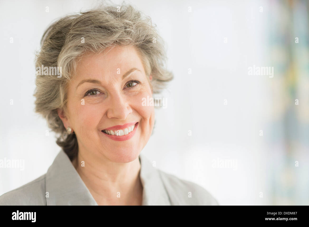 Beautiful woman 60 smiling hi-res stock photography and images - Alamy