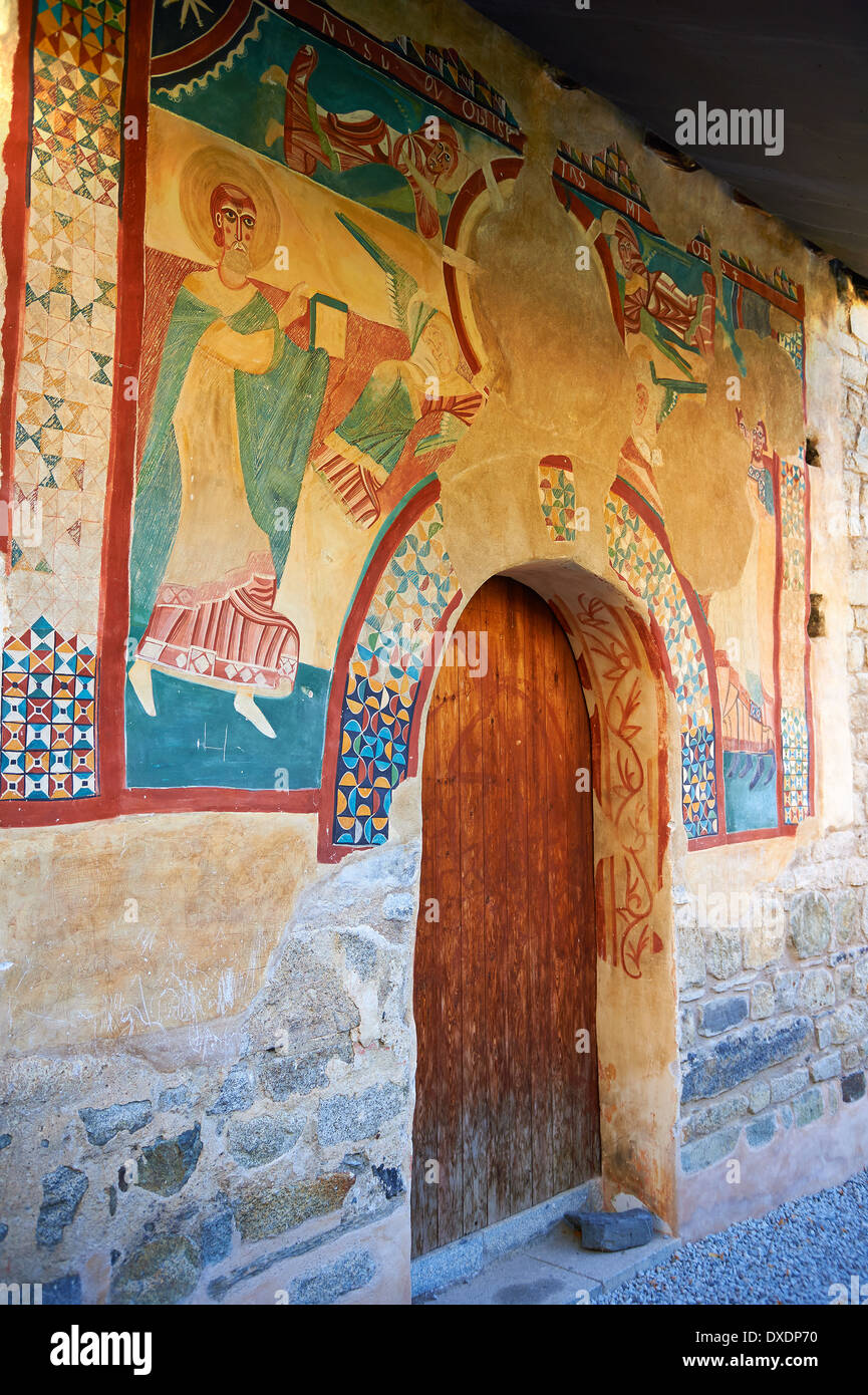 Twelfth century restored Romanesque Fresco paintings  around the entrance to the church of Saint Joan of Boi, Val de Boi, Stock Photo