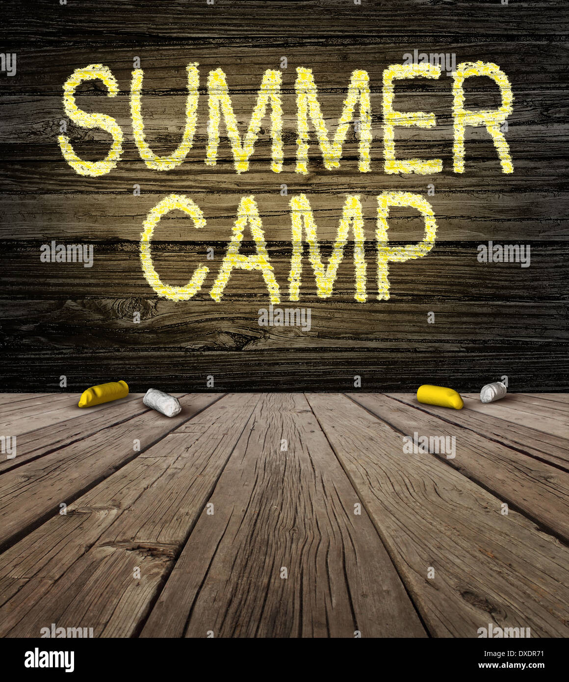 Summer camp sign with a drawing on a natural rustic wooden wall from a country cabin outdoors as a symbol of recreation and fun Stock Photo
