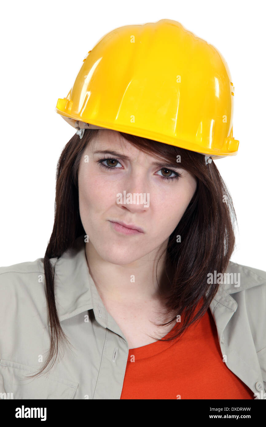 Confused construction worker Stock Photo