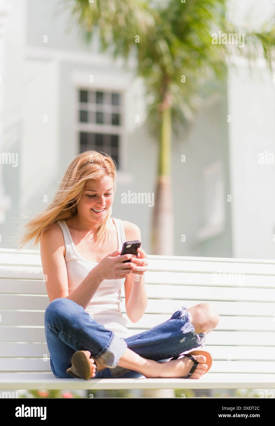 Old woman messaging on mobile phone hi-res stock photography and images ...