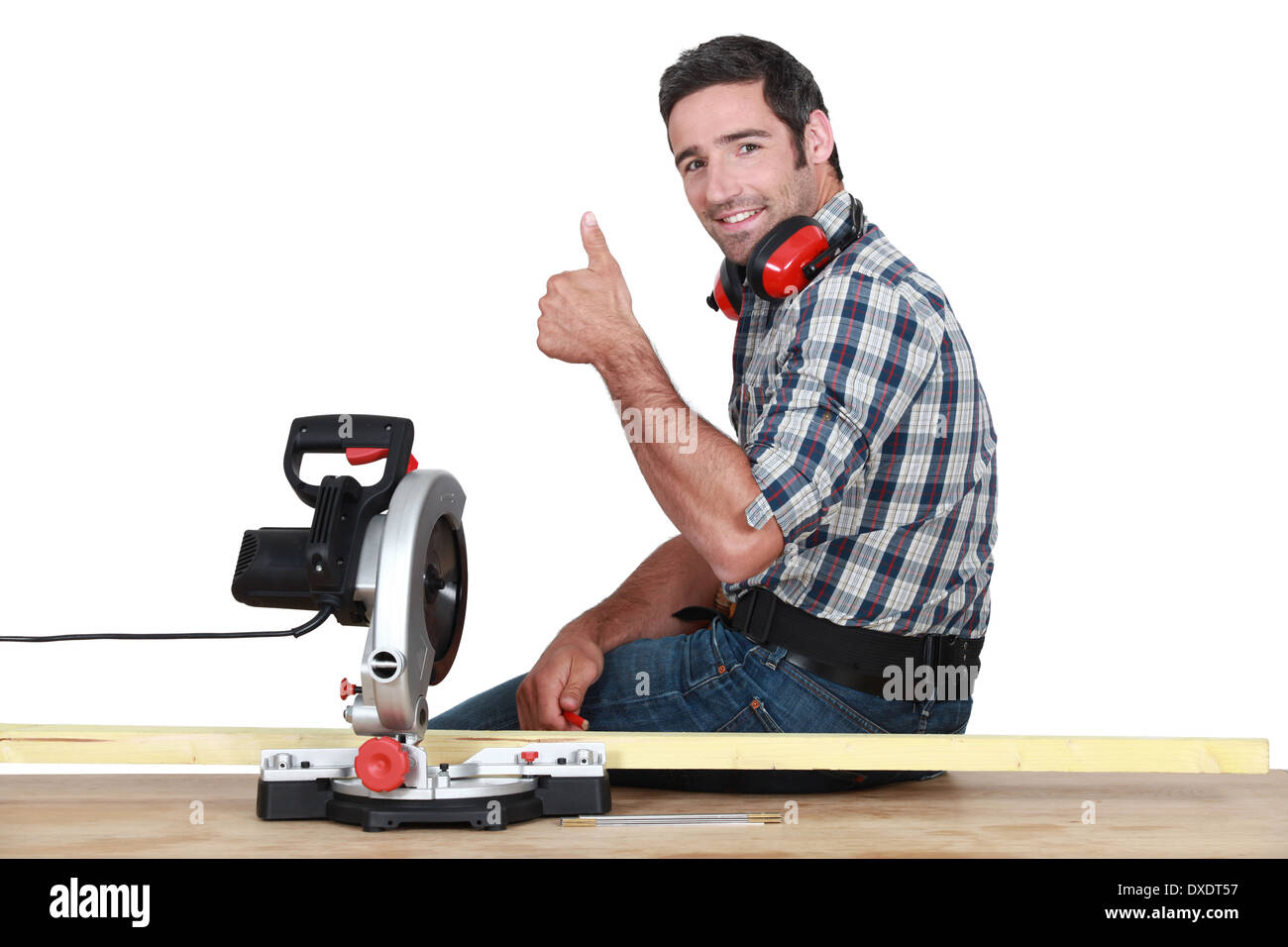 woodworker using circular saw Stock Photo