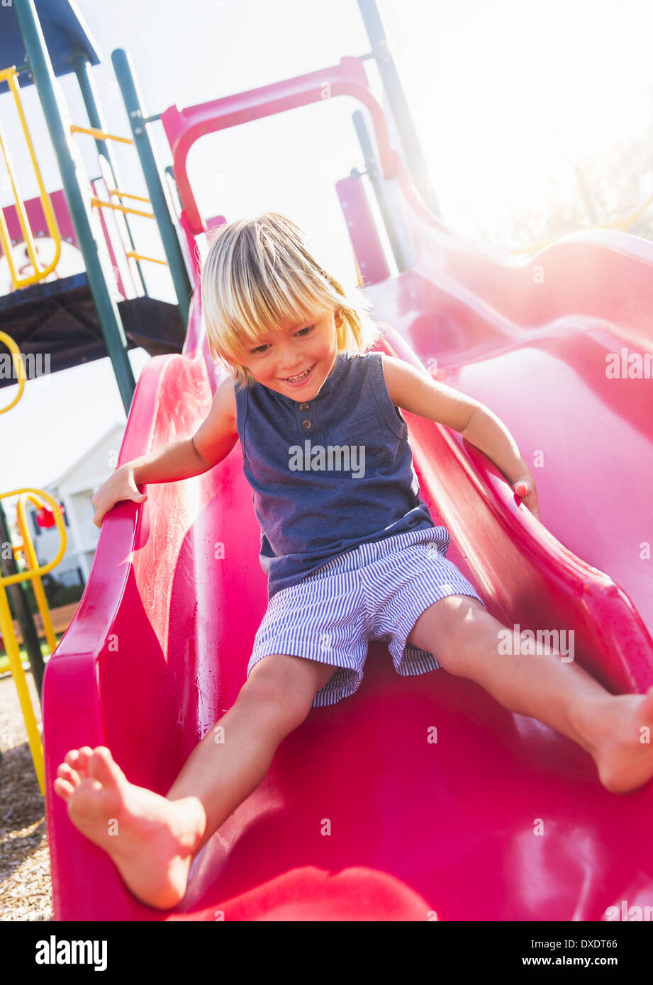 Boy (4-5) playing on playground, Jupiter, Florida, USA Stock Photo