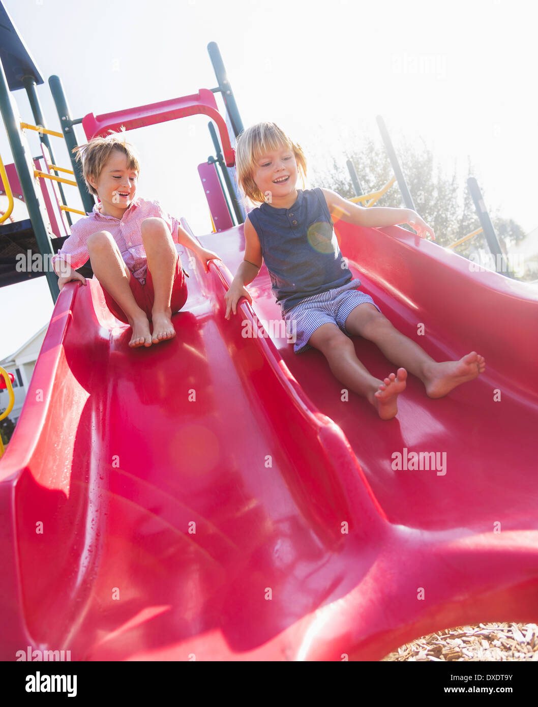 Boys (4-5, 8-9) playing on playground, Jupiter, Florida, USA Stock Photo