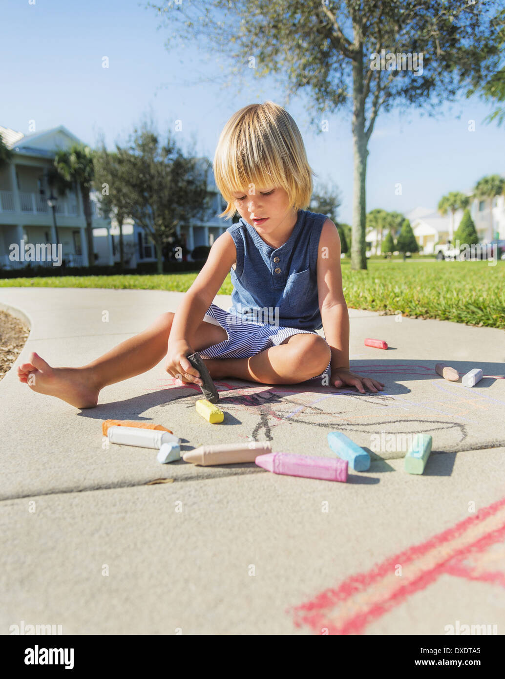 Boy (4-5) playing on playground, Jupiter, Florida, USA Stock Photo