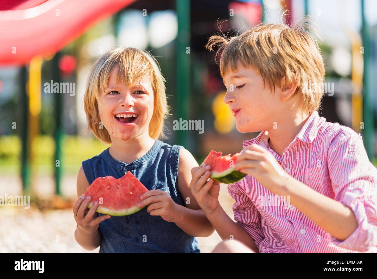 Boys (4-5, 8-9) playing on playground, Jupiter, Florida, USA Stock Photo