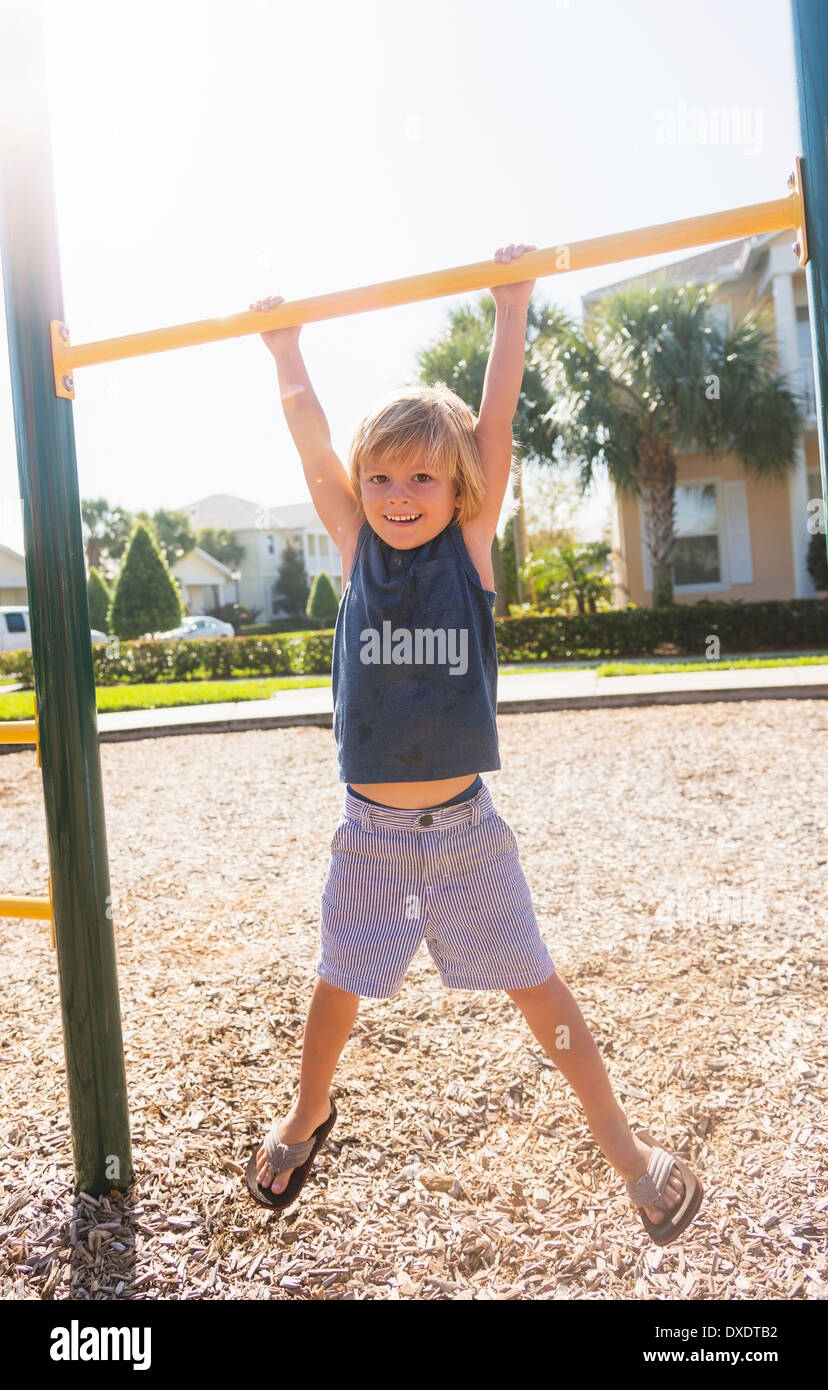 Boy (4-5) playing on playground, Jupiter, Florida, USA Stock Photo