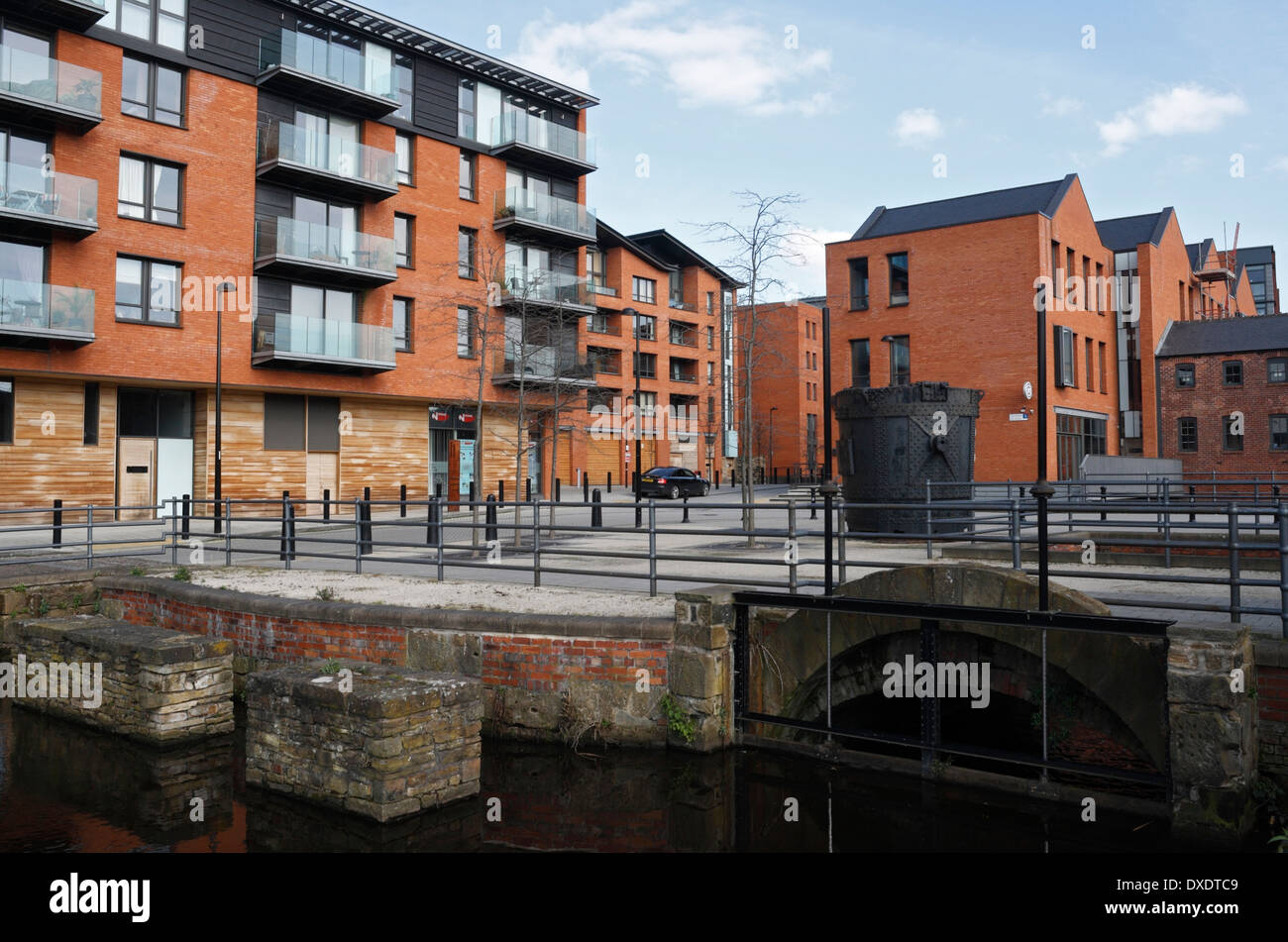 Kelham Island Apartments in Sheffield, England Mill Run in foreground