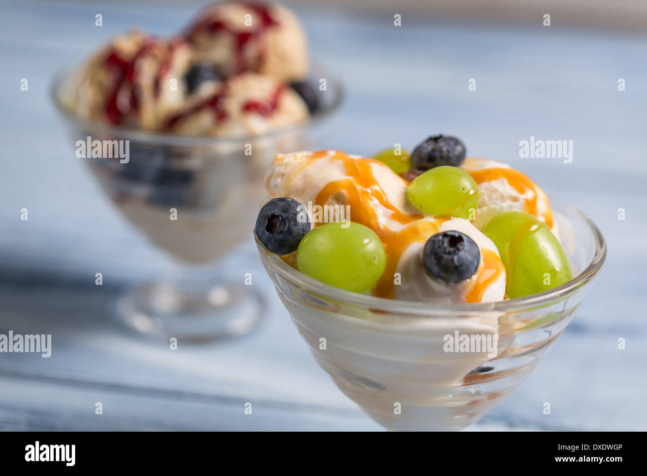 Bowls with ice creams and fresh fruits Stock Photo Alamy