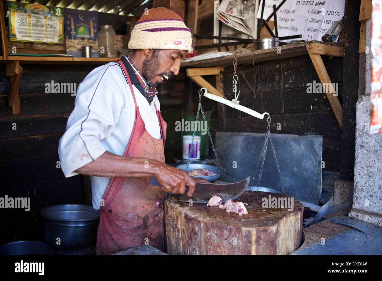 Image of Butcher In a Meat Vending Stall In India-AV635649-Picxy