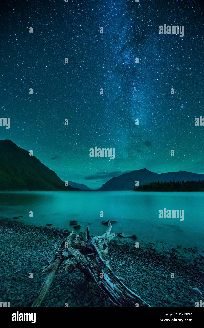 the Milky Way and night sky over Kathleen Lake & the St Elias Mountains, Kluane National Park, Yukon Territories, Canada Stock Photo