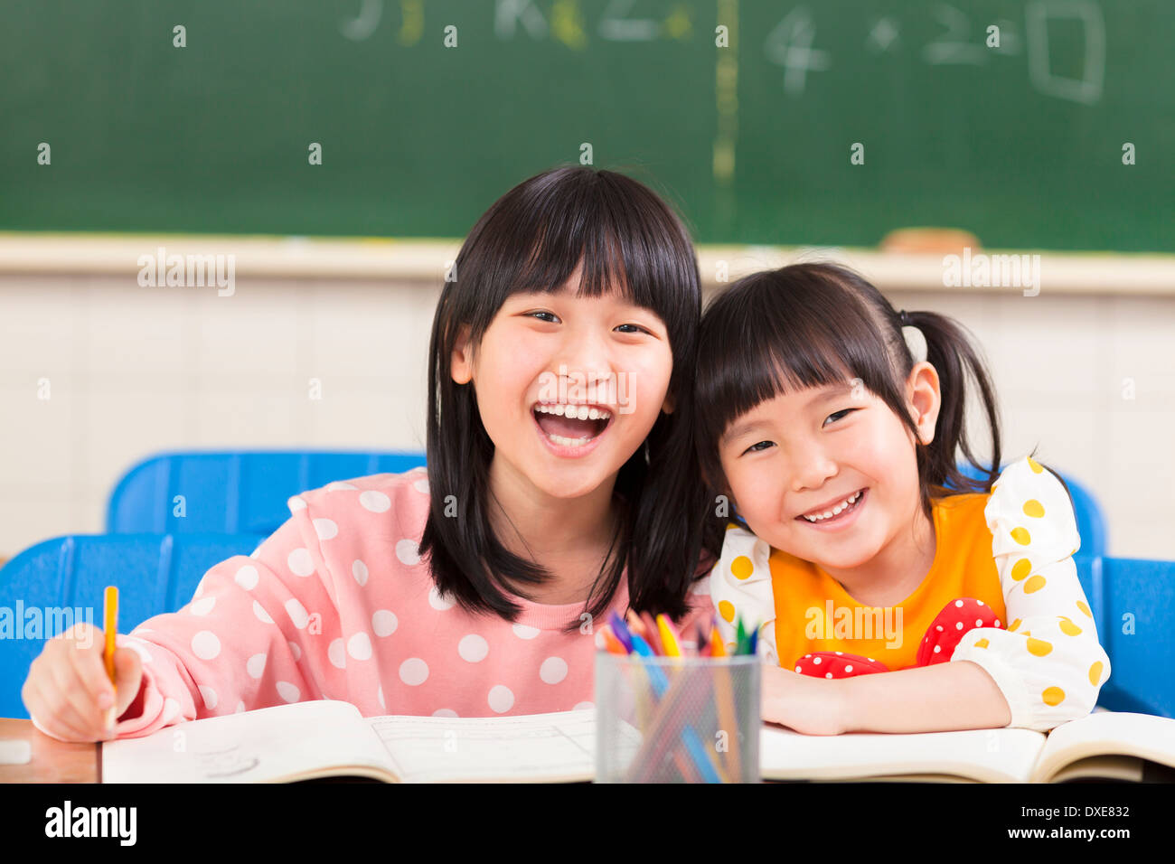asian happy little girls in the classroom Stock Photo