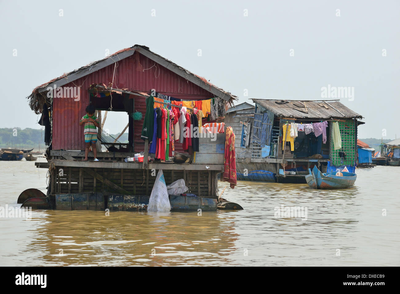 Families  in  their  houses on wooden poles  known as 'Floating Houses 'and 'floating villages' on Tonle Sap lake, Stock Photo
