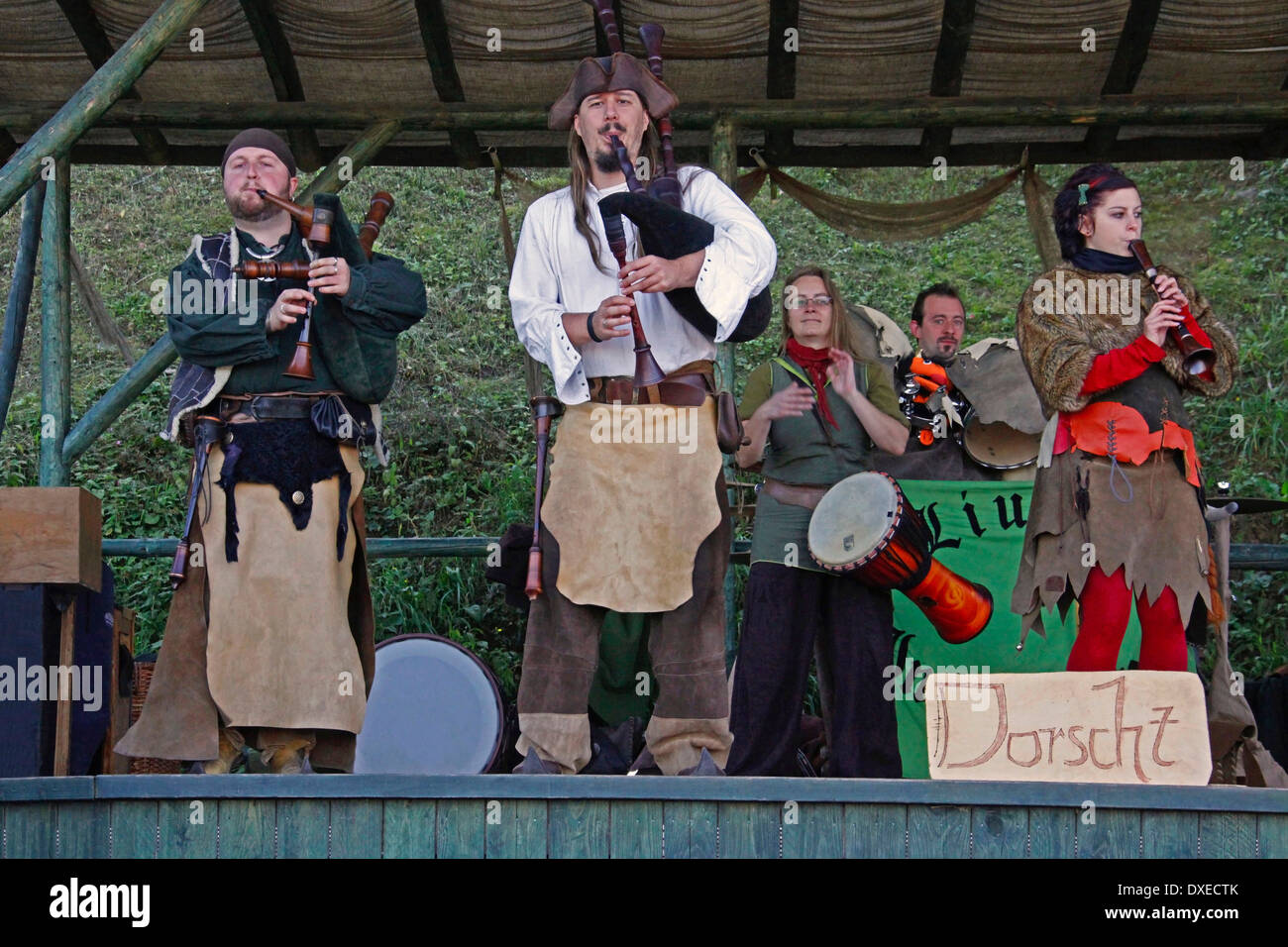 medieval dressed musicians with historical bagpipes medieval market