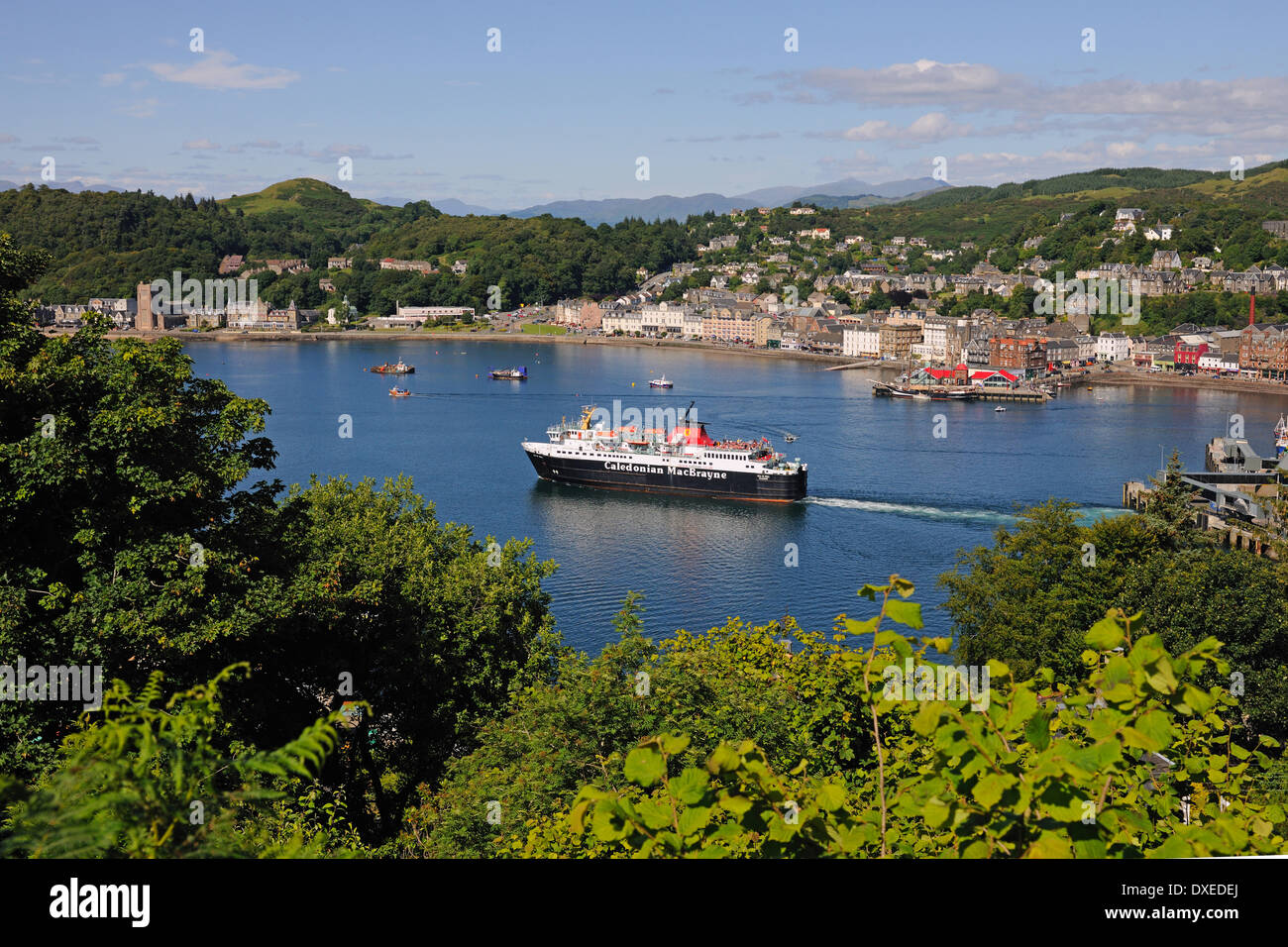 The Mull ferry departs oban bay as seen from Pulpit hill,Oban,Argyll Stock Photo