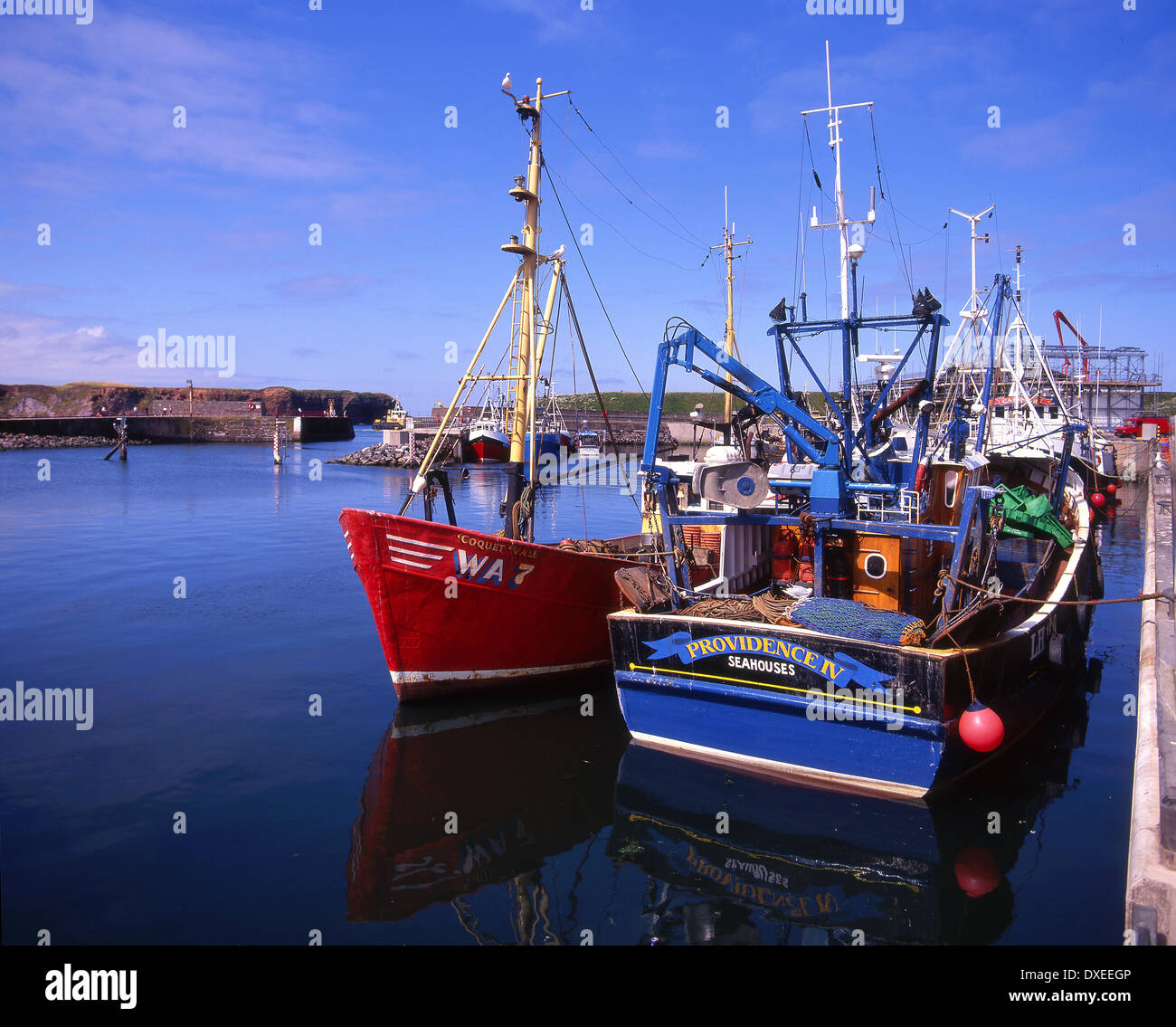 Coastline summer industry fishing industry fishing boats fishing village town trawlers borders