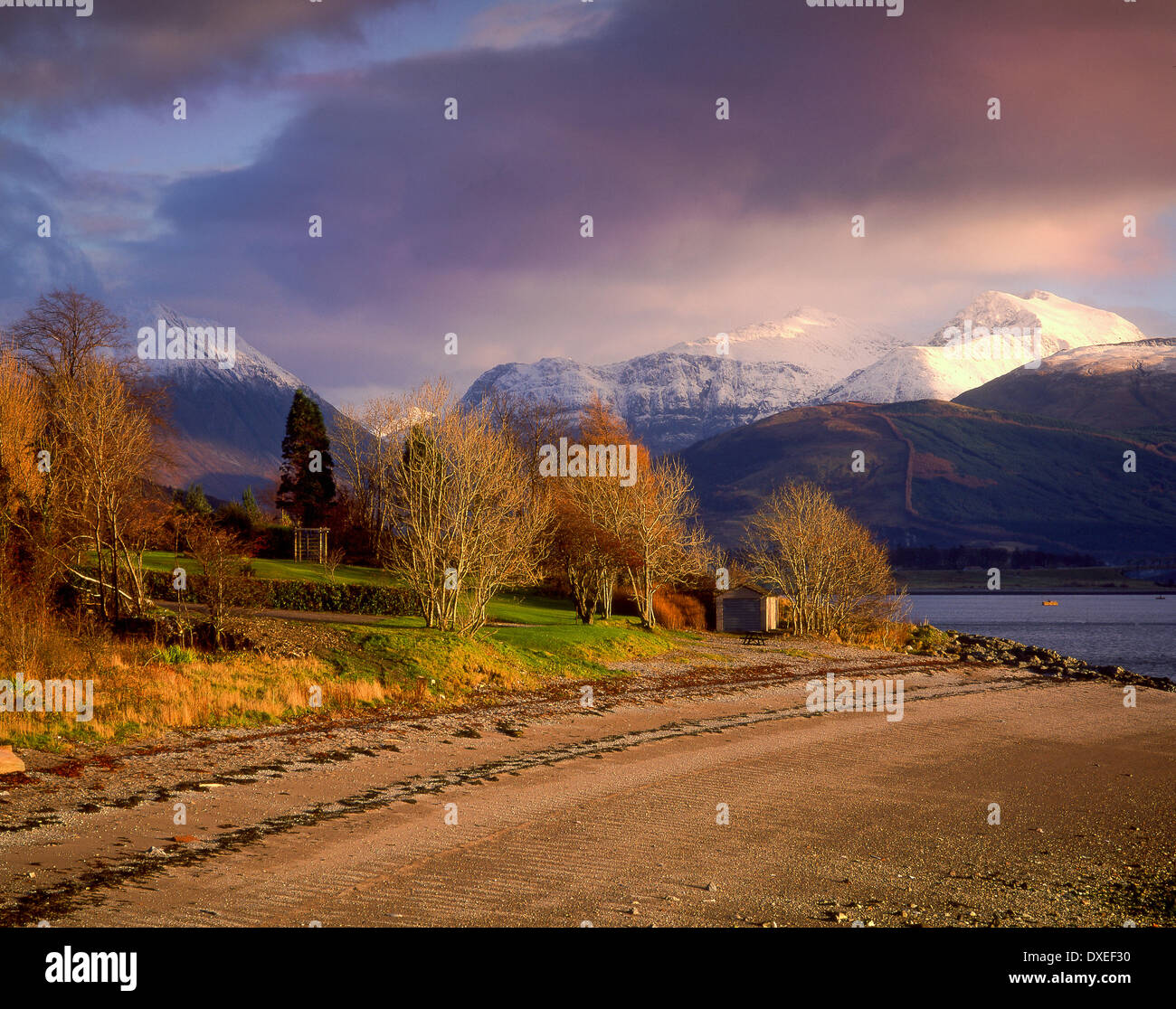 Evening light over the Glencoe Hills as seen from Onich, Lochaber, West Highlands. Stock Photo