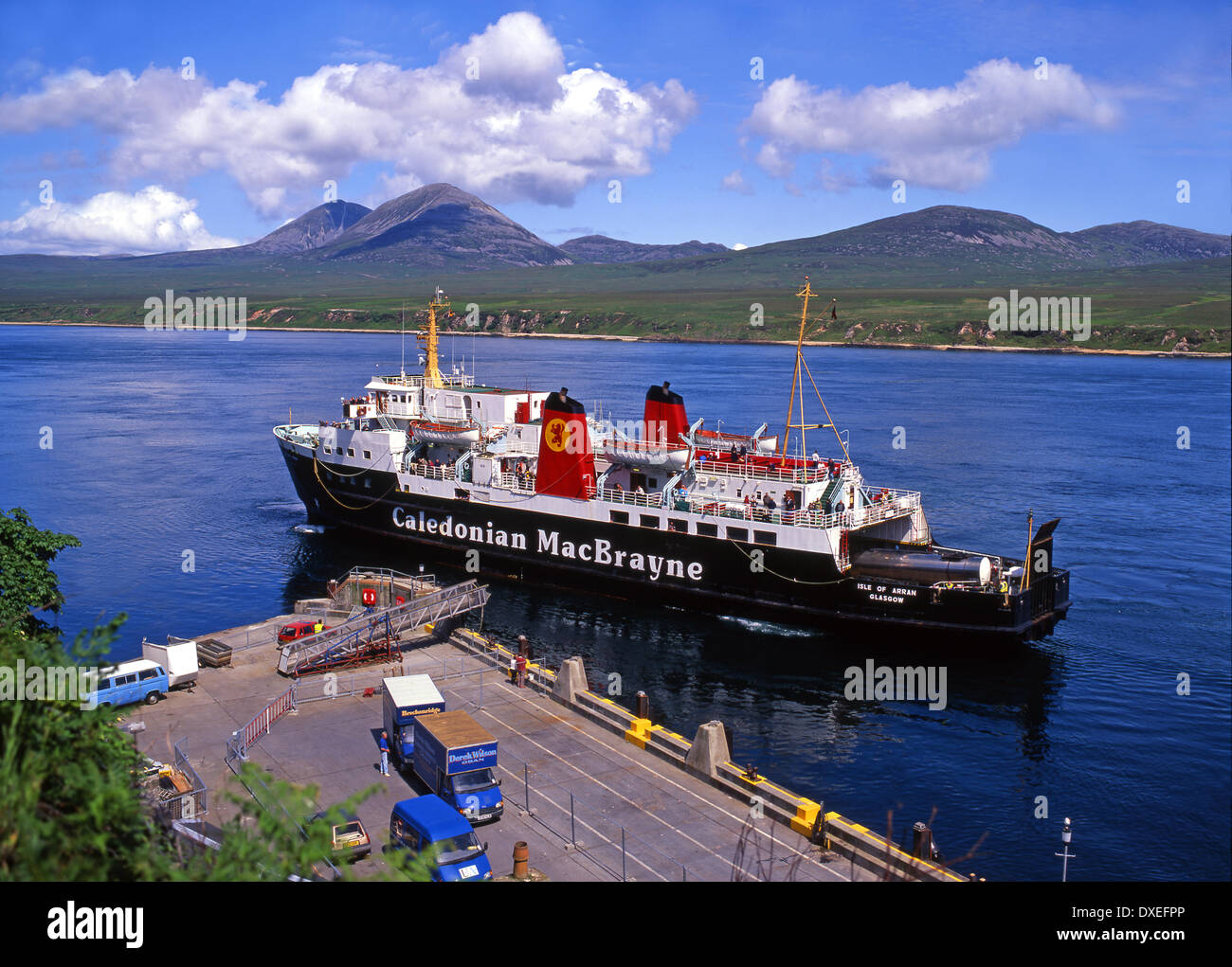 M.V.Isle of Arran berthing at Port Askaig, islay with the paps of jura in view. Stock Photo