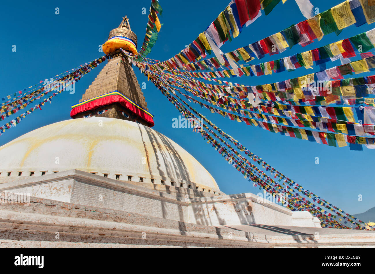 Boudhanath Stupa on a sunny day, in the Kathmandu valley, Nepal Stock Photo