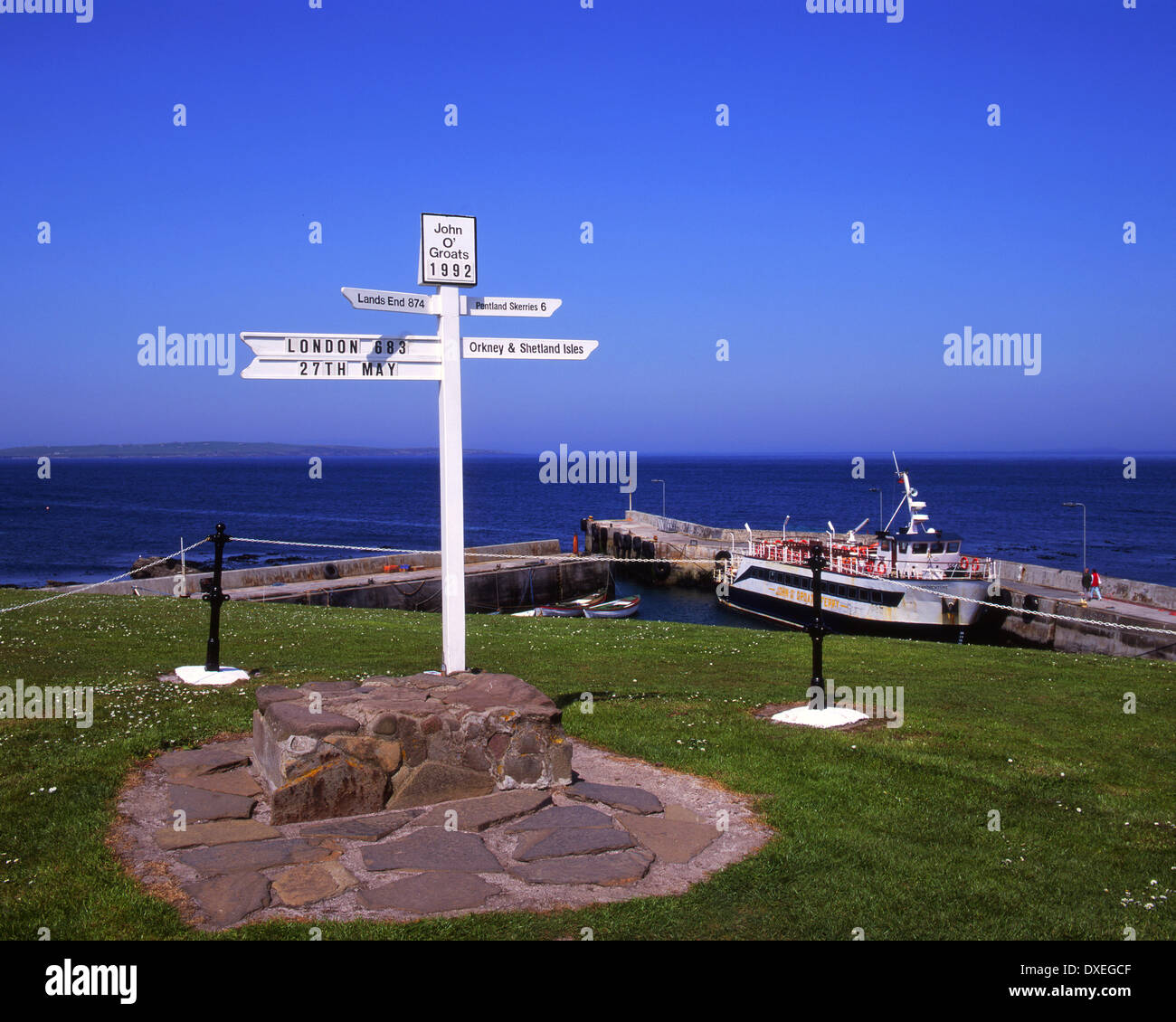 signpost at the harbour in John O Groats,on the caithness coastline.NE scotland Stock Photo