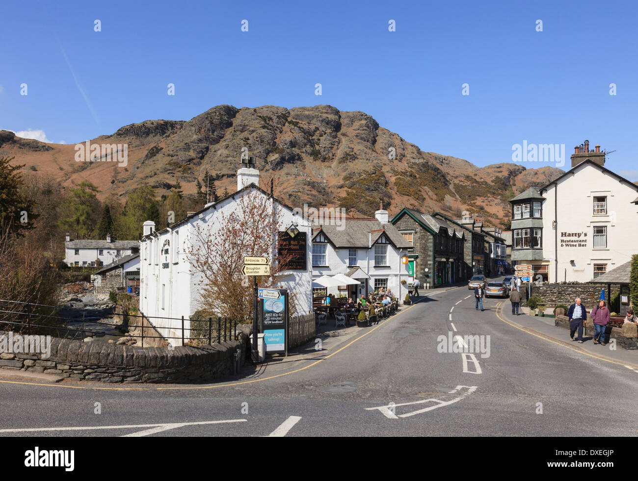 The Black Bull Inn hotel and Lakeland village centre in Lake District National Park. Coniston, Cumbria, England, UK, Britain Stock Photo