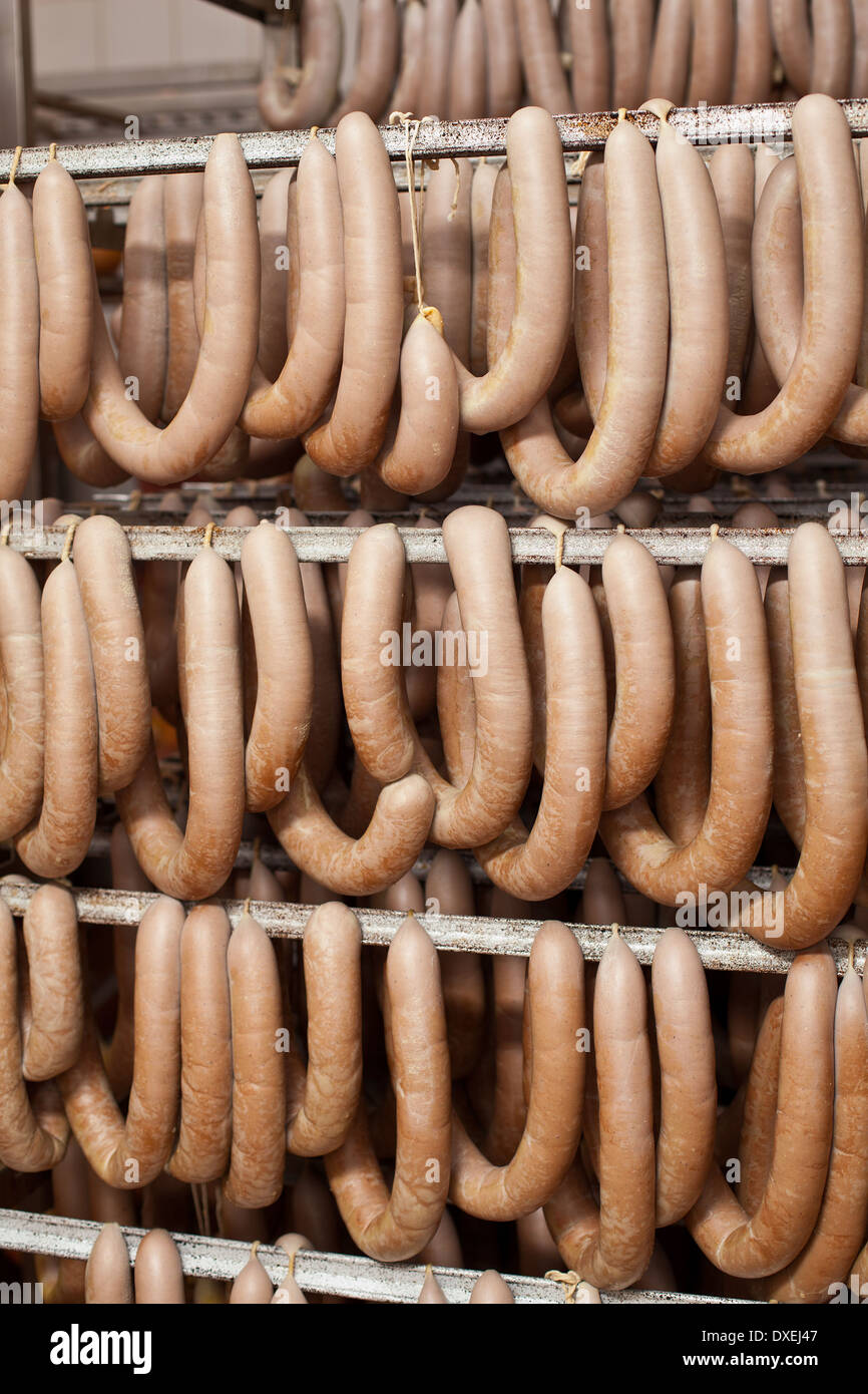 Sausage products at the cooler storage. Stock Photo