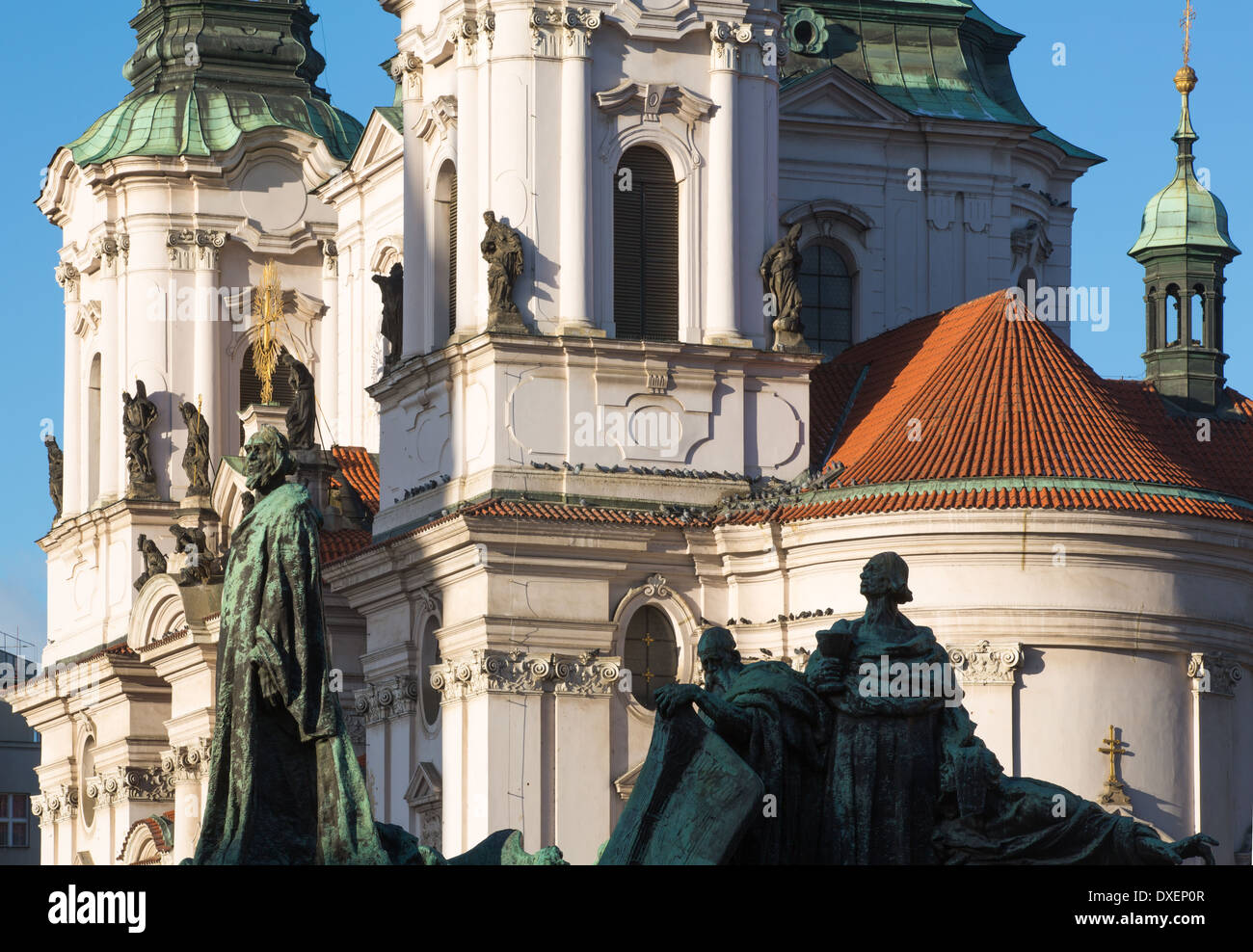the Jan Hus Memorial and Church of At Nicholas, Old Town Square, Prague, Czech Republic Stock Photo