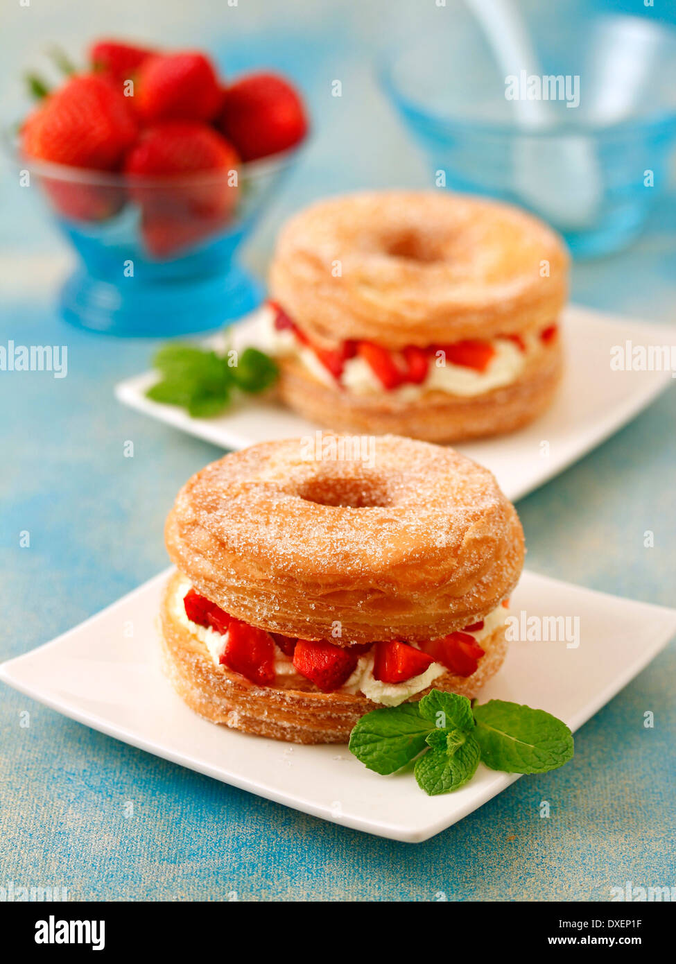 Cronuts with strawberries and mascarpone. Recipe available Stock Photo ...