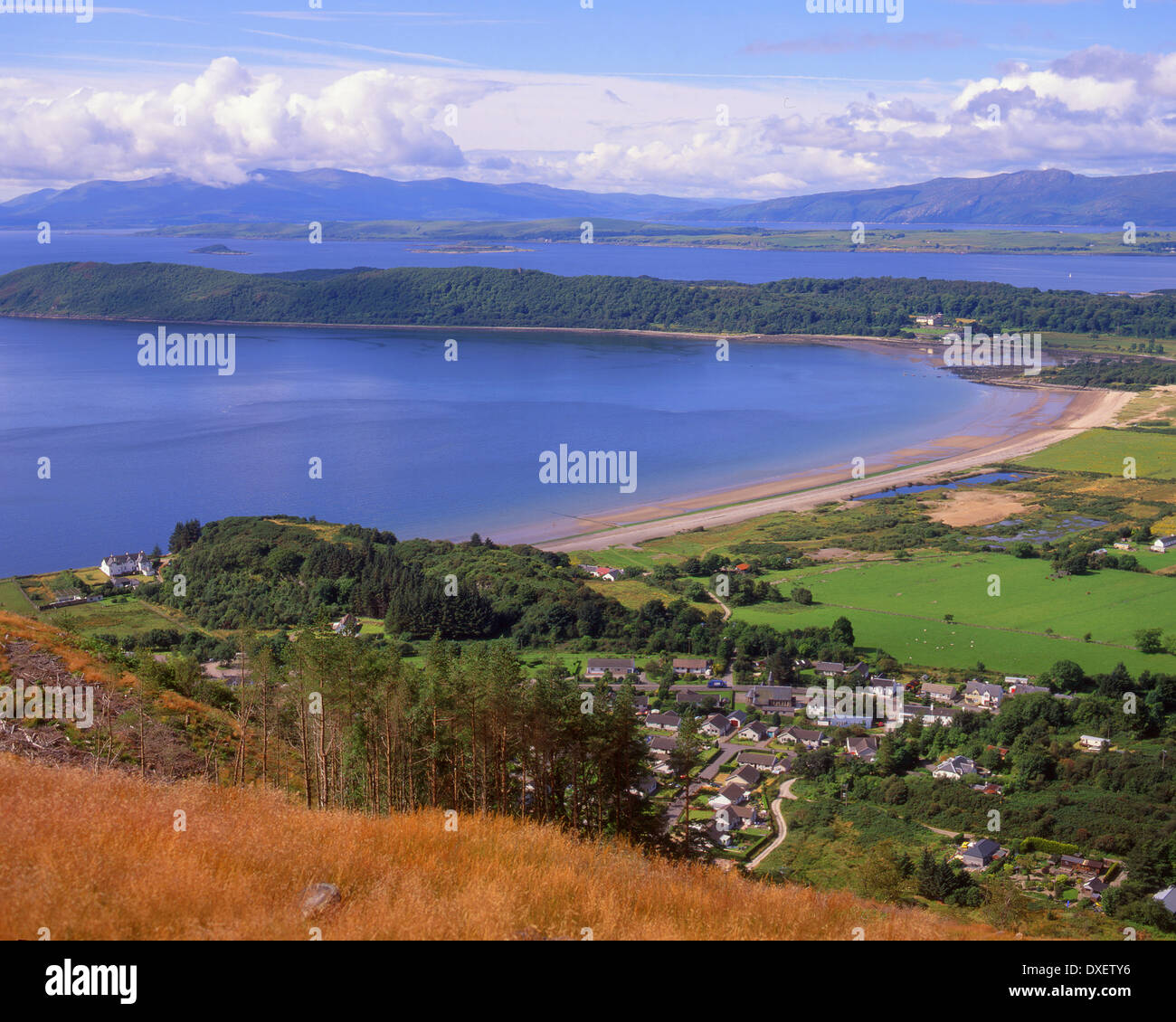 View from ben Lora towards benderloch village and tralee bay beach and the islands of Lismore and Mull Stock Photo