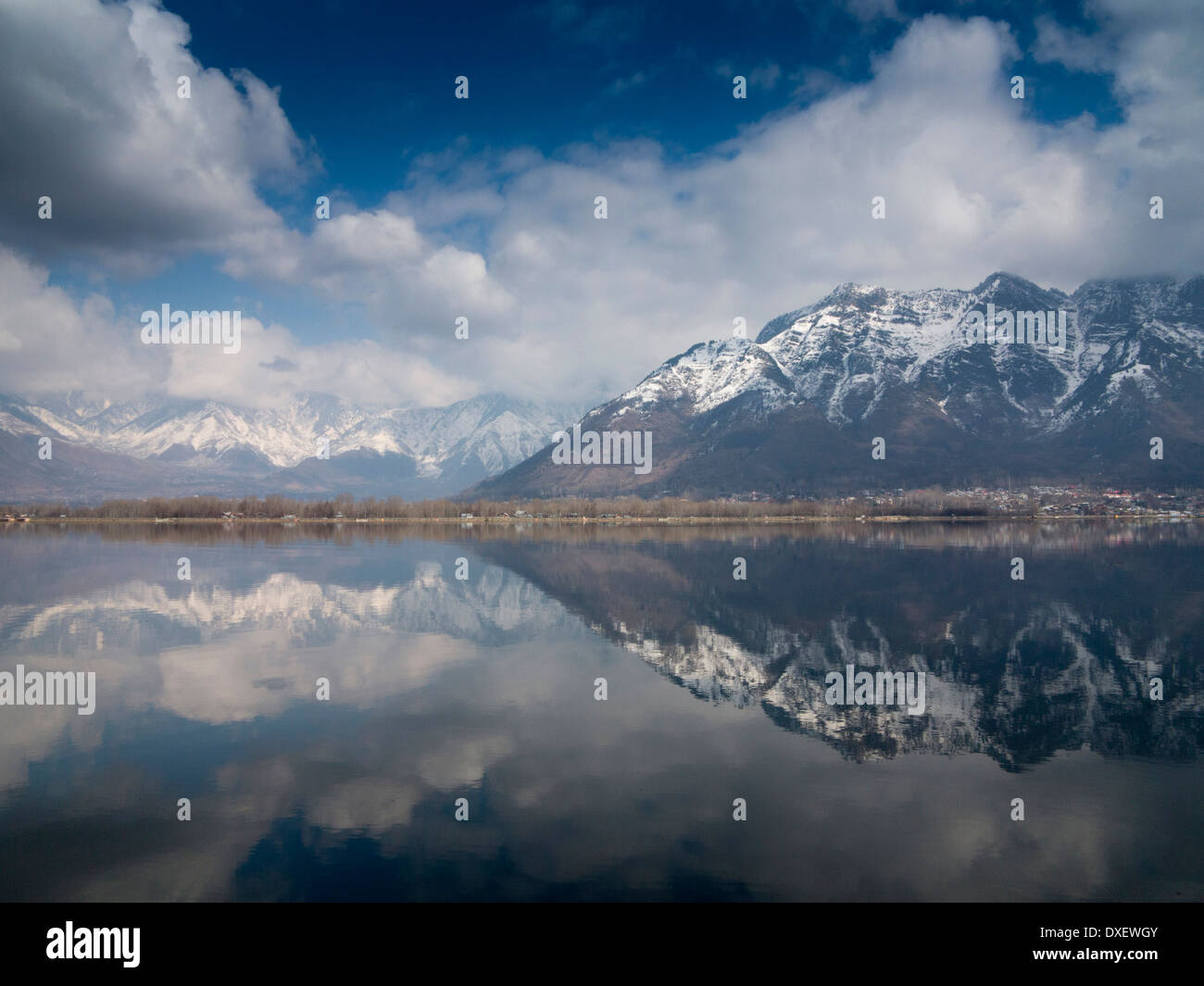 India, Kashmir, Srinagar, snow-capped Zabarwan mountains surrounding Dal Lake Stock Photo