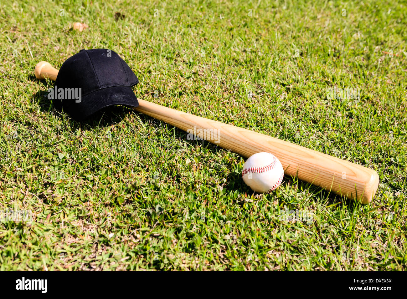 Concept photo of a Baseball Bat Ball and black hat Stock Photo Alamy