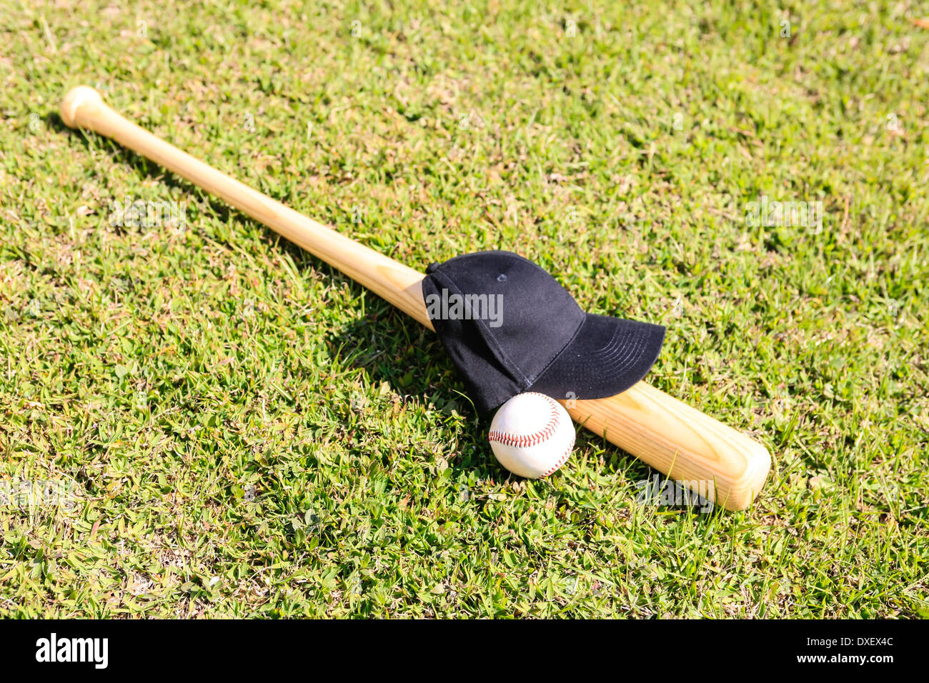 Concept photo of a Baseball Bat Ball and black hat Stock Photo Alamy